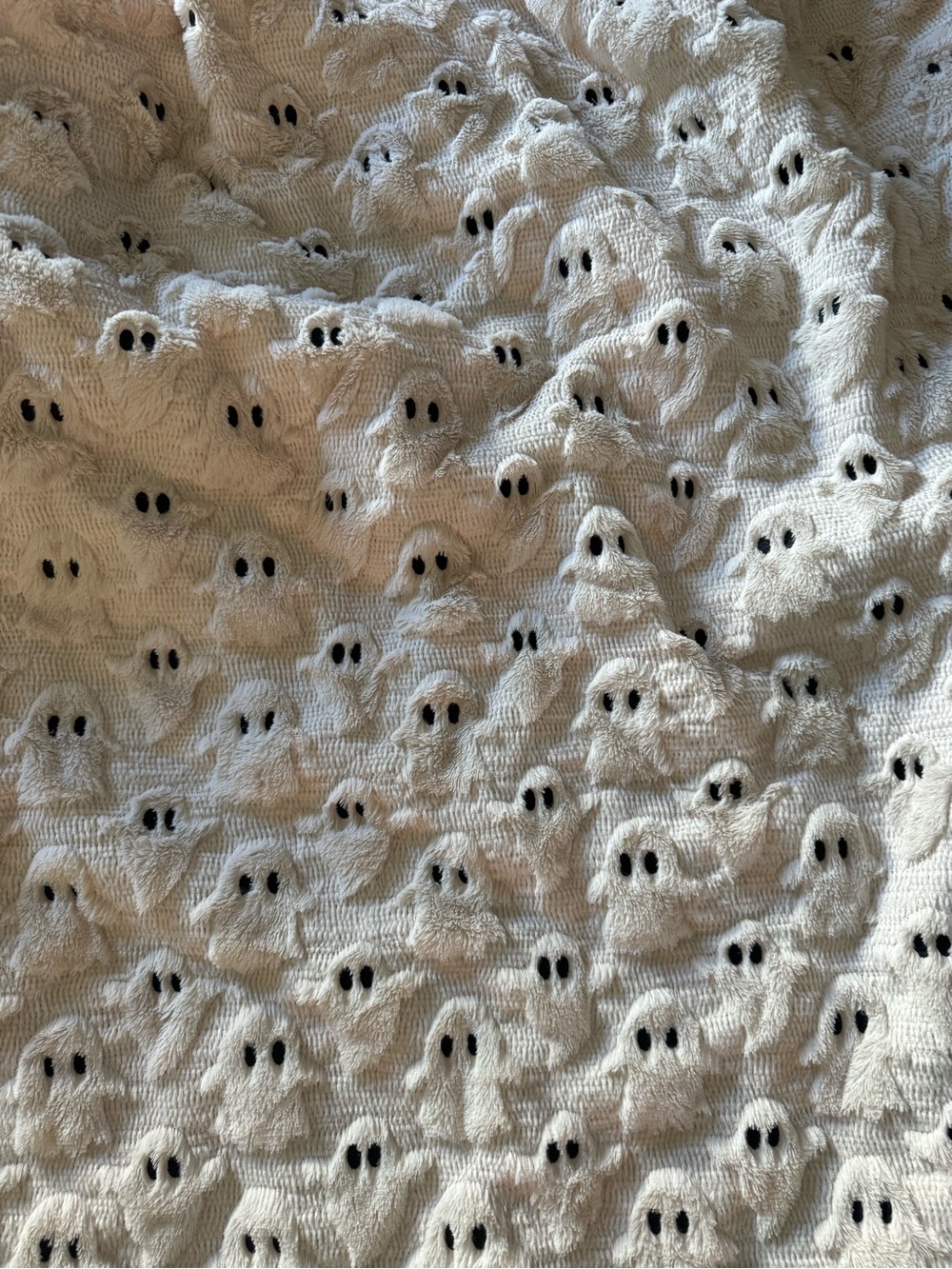 Ashland Cream Knit Throw with Playful Ghost Motif